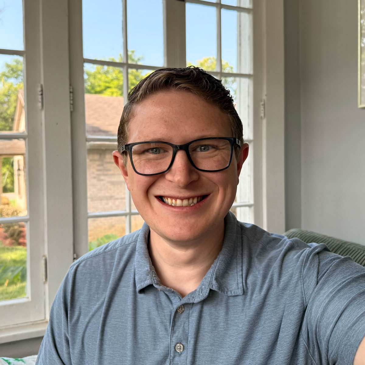 Headshot of Austin Baker, Senior Marketing Consultant and video creator